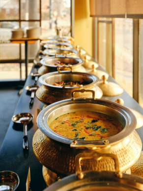 Vegetarian buffet serving dishes prepared for the community lunch